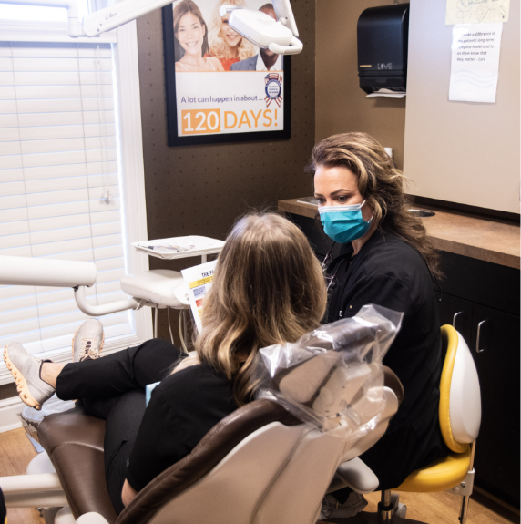photo of smiling dental team